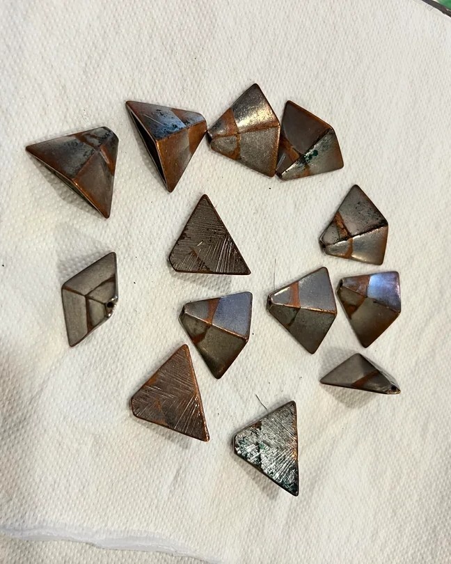 what-are-these-small-irregular-pyramids-made-of-metal-v0-ityypojf9w1h1